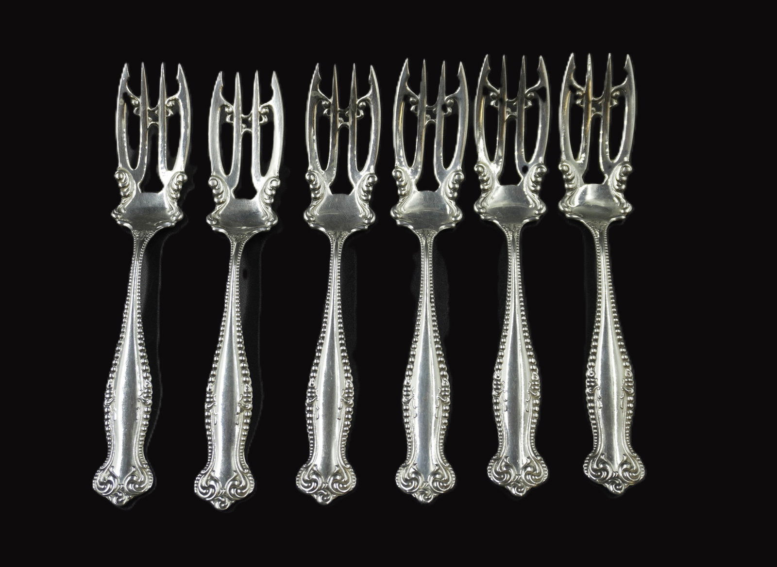 6 STERLING SILVER CANTERBURY SALAD FORKS: Six (6) Sterling Silver Canterbury c. 1900 Salad Forks by Towle. No monograms. Approximate silver weight 160 grams.