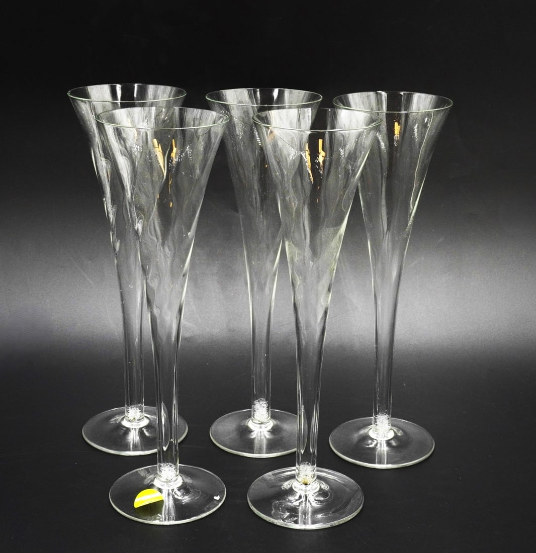 5 TALL FLUTED BLOWN GLASS CHAMPAGNES: Five Fluted Blown Glass Champagnes in the Perignon Pattern by Toscany. Each 9 7/8". Weight on all 1 lb 3 oz. PROVENANCE: The Charles Drayton House, 25 E. Battery, Charleston, SC