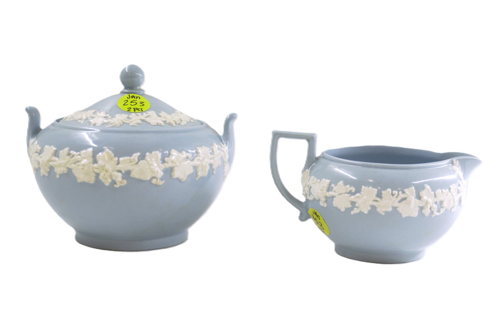 VINTAGE WEDGWOOD 2 PIECE CREAMER AND SUGAR SET: Vintage Wedgwood 2 Piece Creamer and Sugar Set. Stamped/marked on bottom. Sugar measures 4.25" x 5" and creamer measures 3" x 5", weighs 1 lb 3 oz.