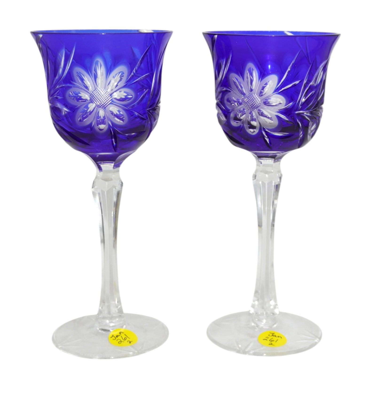 2 VINTAGE COBALT CUT TO CLEAR BOHEMIAN CRYSTAL GLASSES: Vintage Cobalt cut to Clear Bohemian Crystal Wine Glasses with Floral and Foliage cut on Clear Stems. 3.5"x3.5"x8". Weight 1 lb 6 oz.