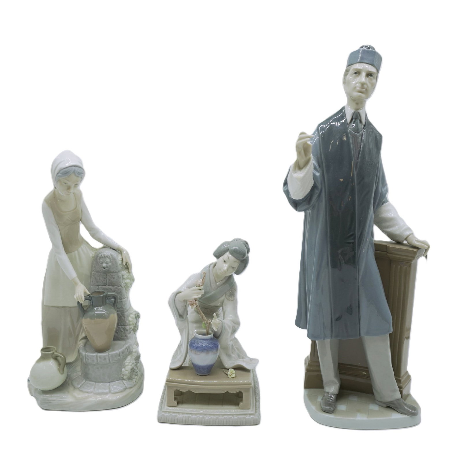 LOT OF VINTAGE LLARDO - 3 PIECES: 3 vintage Llardo pieces. All signed on bottom. This lot includes 1) Japanese Flower Arranger. Measures about 7.5" tall, 6" long, and 4.5" wide. 2) Girl at The Water Well Fountain. Measures about 11.5"