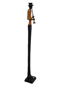 TALL SLENDER JAZZ MUSICIAN PLAYING HORN