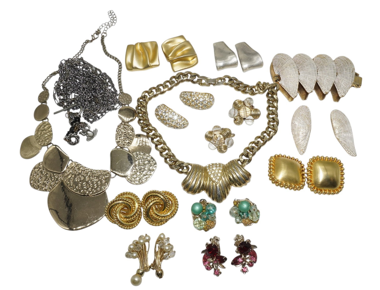 24 PIECES VINTAGE COSTUME JEWELRY: 24 Pieces of Vintage Costume Jewelry. This lot includes 1 bracelet, 10 pairs clip ons, 3 necklaces. Total lot weight is 1 lb 3 oz.