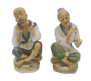 JAPANESE BISQUE PORCELAIN OLD MAN AND WOMAN FIGURINES
