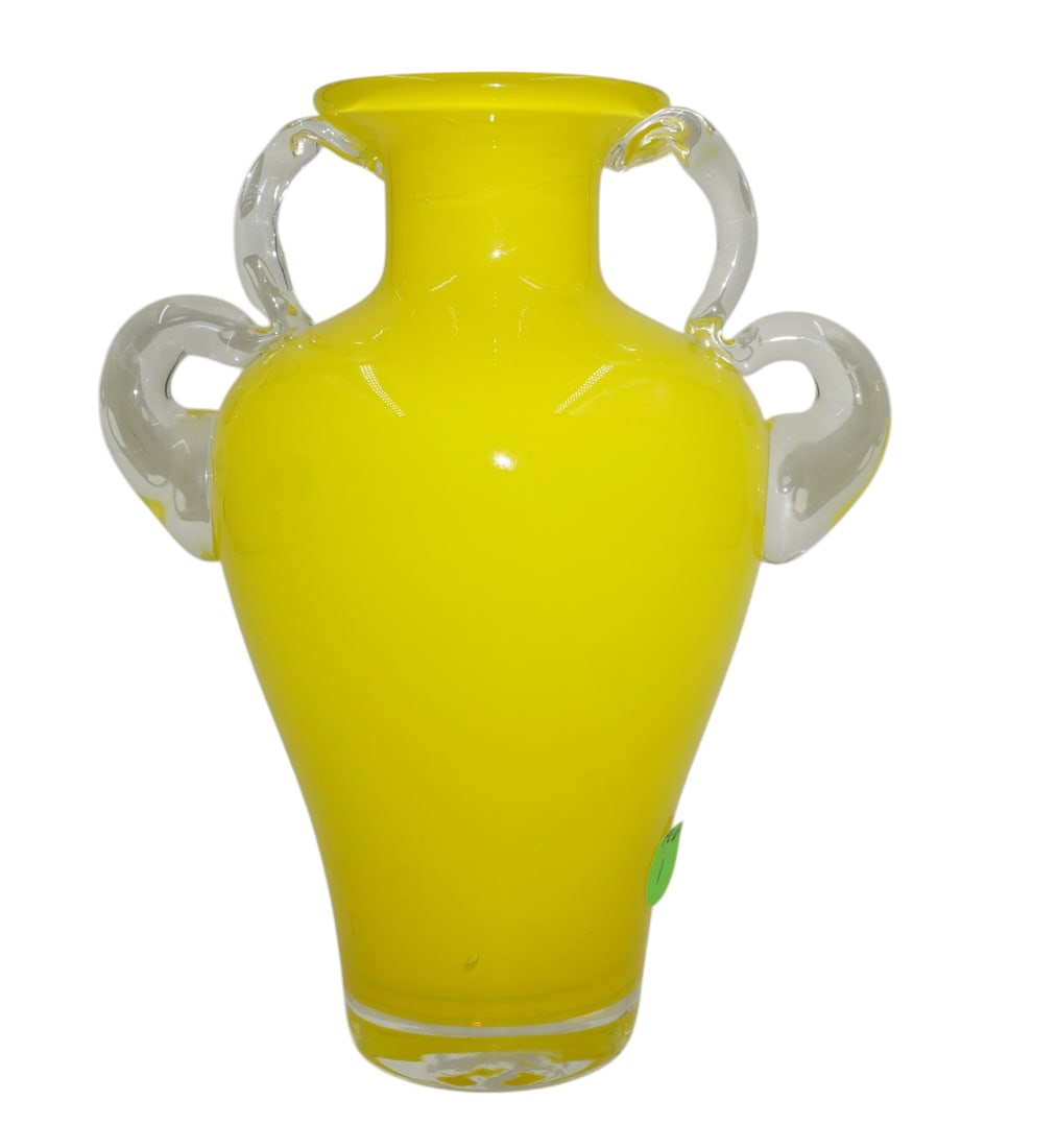 VINTAGE YELLOW CASED GLASS VASE: Vintage Yellow Cased Glass Vase with applied clear handles. Measures 6"x4"x8". Weight 2 lbs