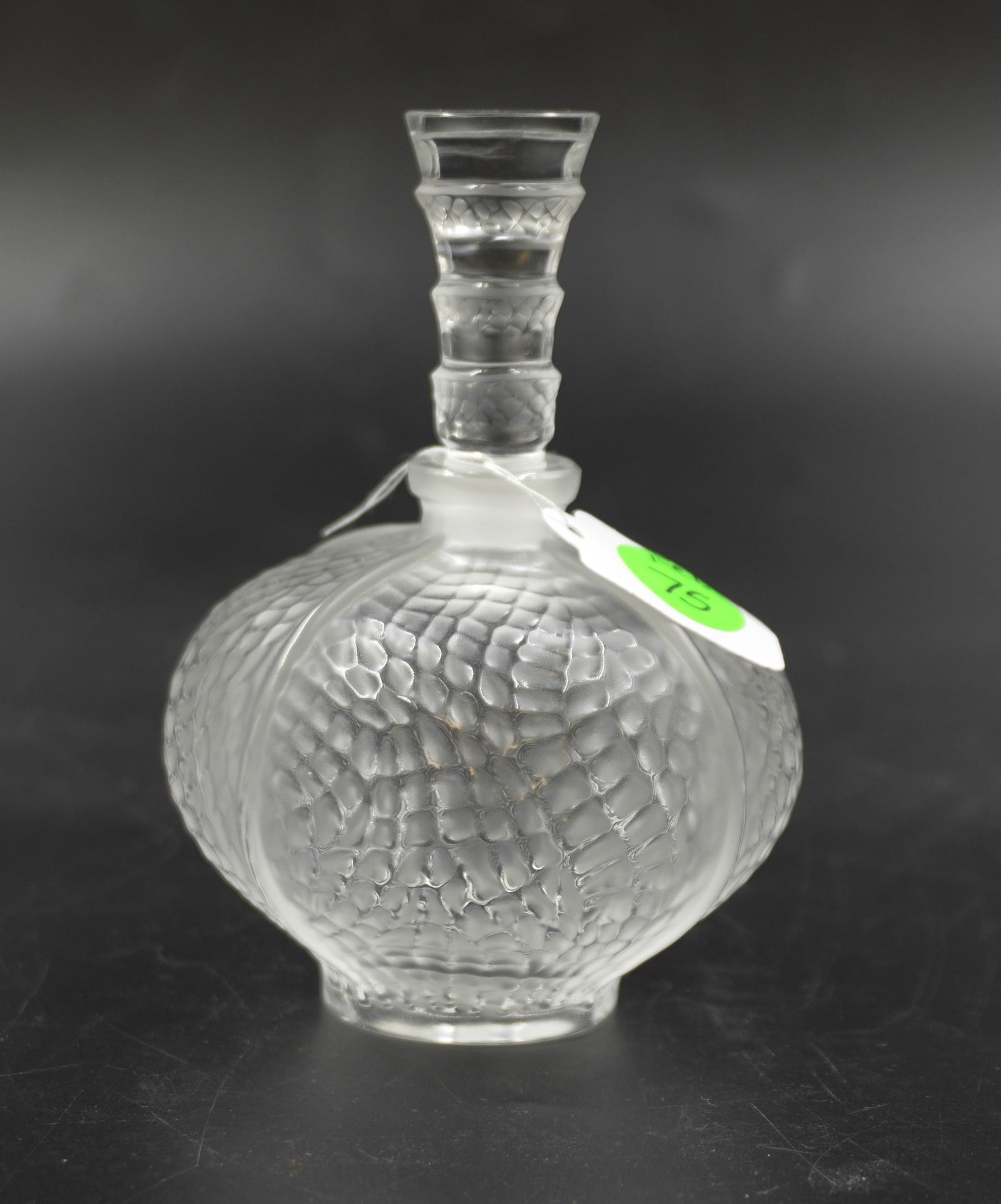 LALIQUE CRYSTAL ELISELLES PERFUME AND STOPPER: Lalique Crystal France Eliselles Perfume and Stopper. Signed. Measures 5" tall. PROVENANCE: Part of a large Charleston collection of Lalique Crystal we will be auctioning.