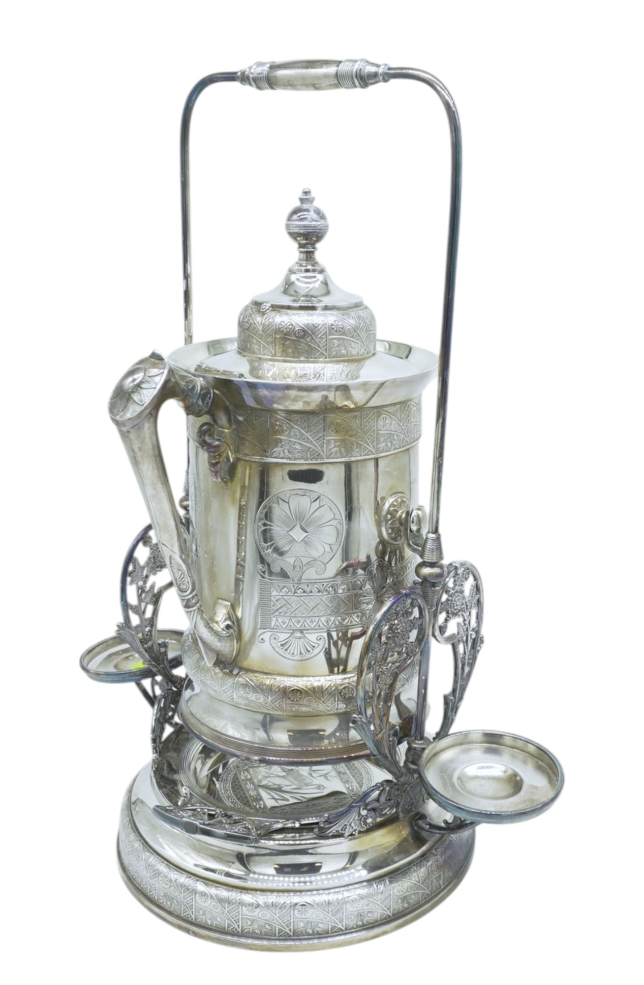ANTIQUE AMERICAN AESTHETIC TILTING WATER PITCHER: Antique American Aesthetic Tilting Water Pitcher by Derby Silver Company. Measures 16"x10"x21". Weight 12 lbs 10 oz. PROVENANCE: The Perrin family, of French Huguenot origin, of Abbeville, Perrin Plan