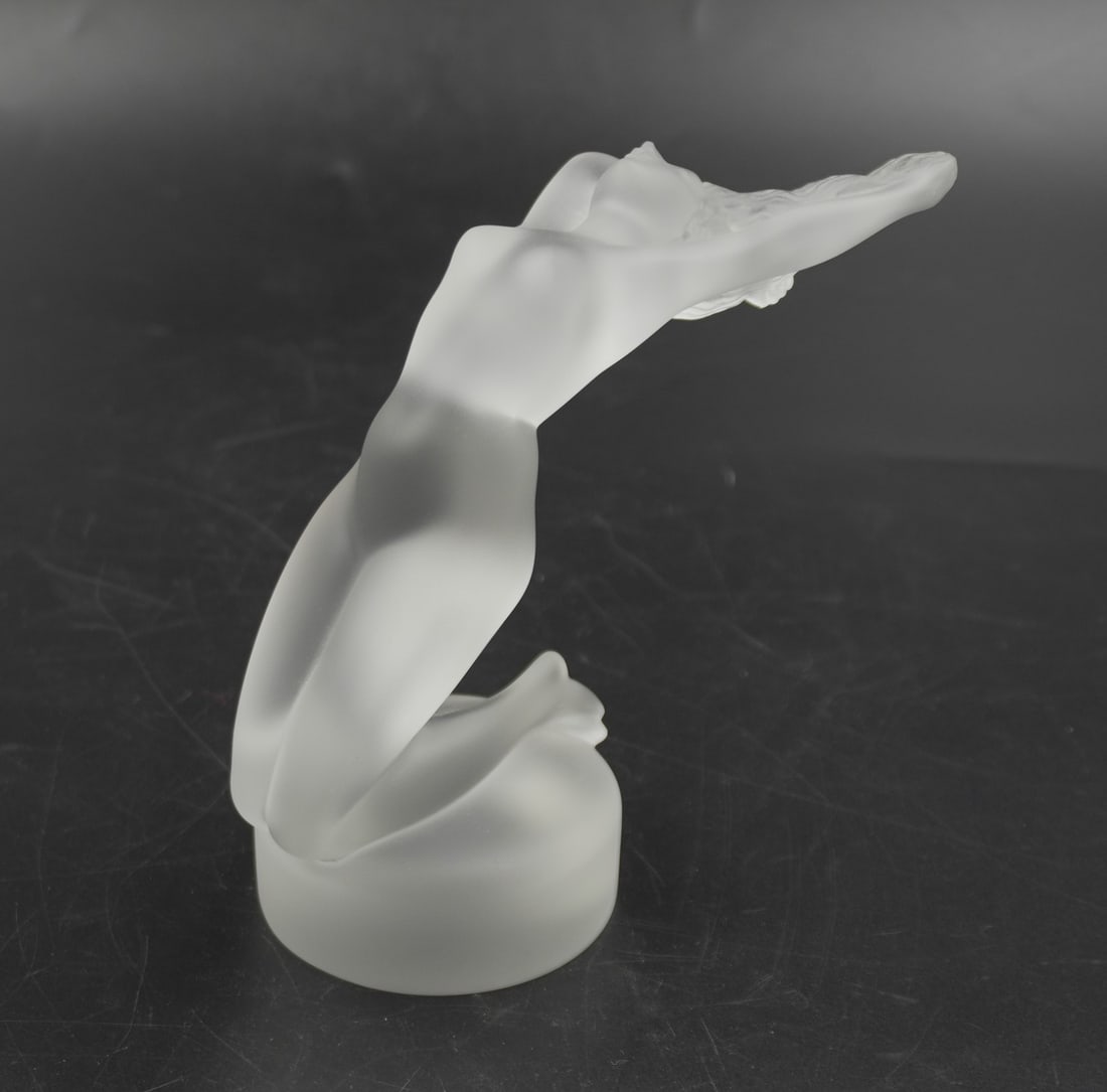 LALIQUE CRYSTAL CHRYSIS NUDE WOMAN: Lalique Crystal France Chrysis Nude Woman. Signed. Measures 5 1/2"x3"x5 1/2". Weight 1 lb 10 oz. PROVENANCE: Part of a large Charleston collection of Lalique Crystal we will be auctioning.