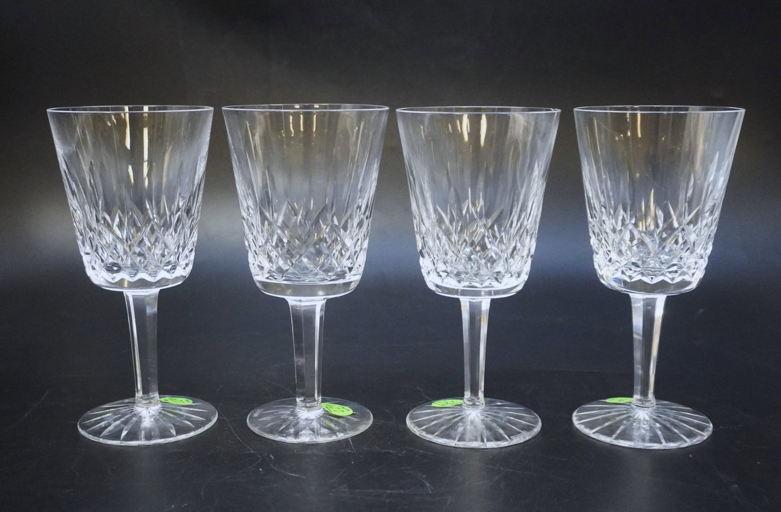 WATERFORD LISMORE GOBLETS - 4 PIECES: 4 Waterford Crystal Lismore Goblets. The Waterford Lismore pattern is a stunning combination of brilliance and clarity. Elegant and versatile, the Lismore Goblet can be used for serving wine, water or