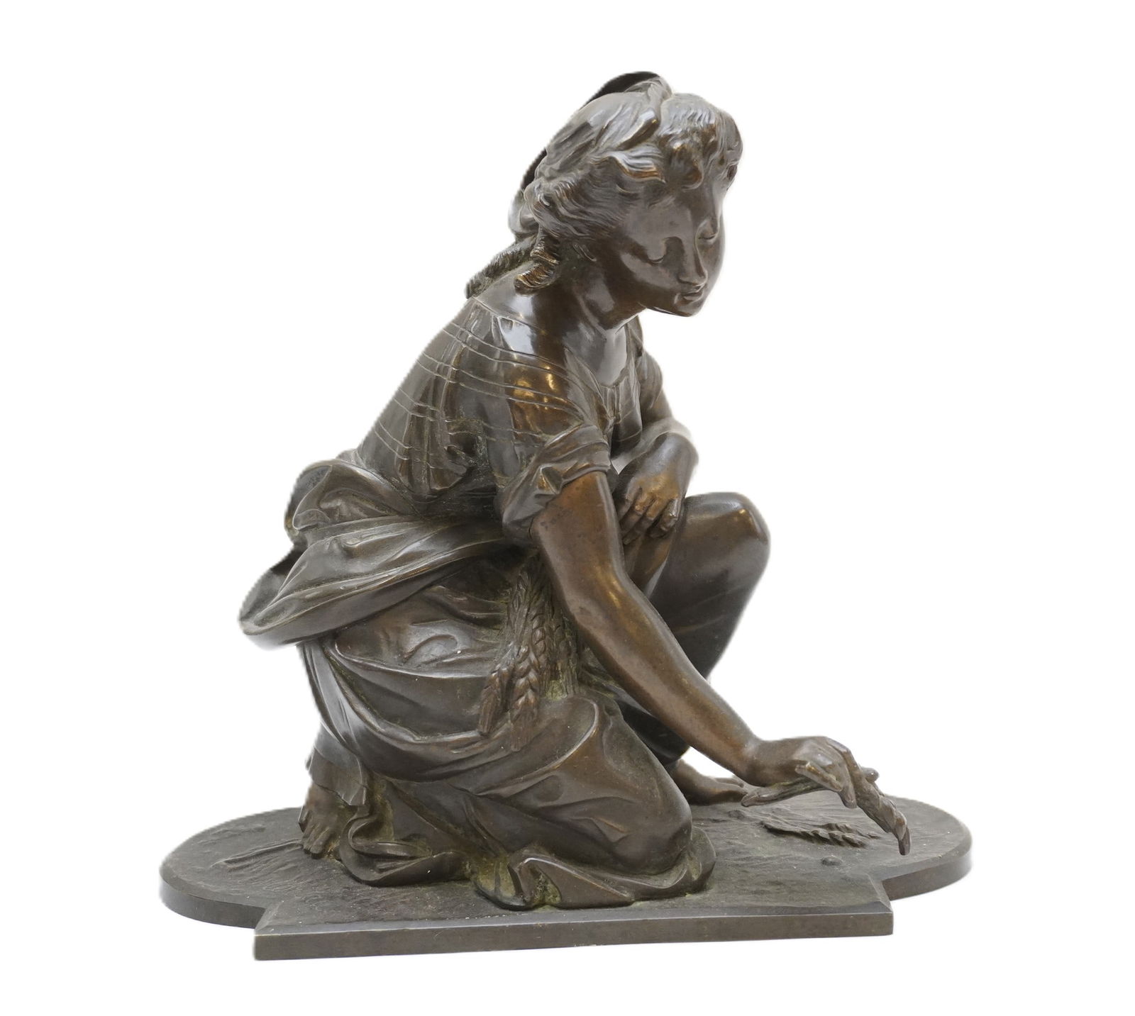 ANTIQUE FRENCH AUGUSTE MOREAU BRONZE WOMAN WITH WHEAT: Antique French Auguste Moreau Bronze Woman harvesting wheat. Weighs 8 lbs 9 oz. and measures 9.25" x 9.5" x 4.5" Provenance: Gippy Plantation, Avenue of Oaks, Berkeley County, SC