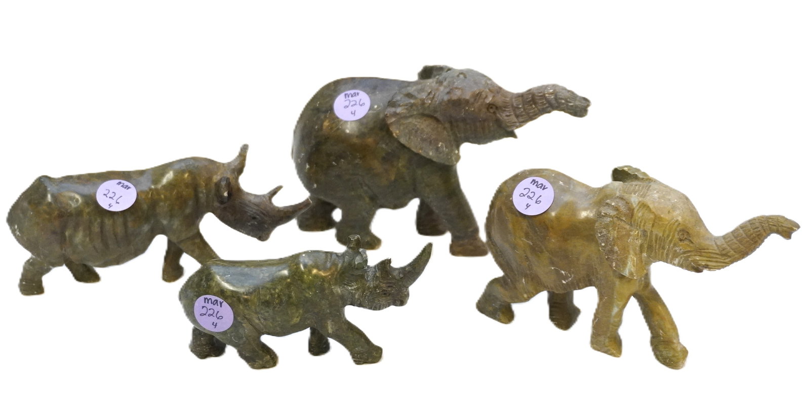 4 VERDITE STONE CARVED RHINOS & ELEPHANTS: 2 Verdite Carved Rhinos 6" and 2 Elephants 6". Weight on all 3 lbs 13 oz