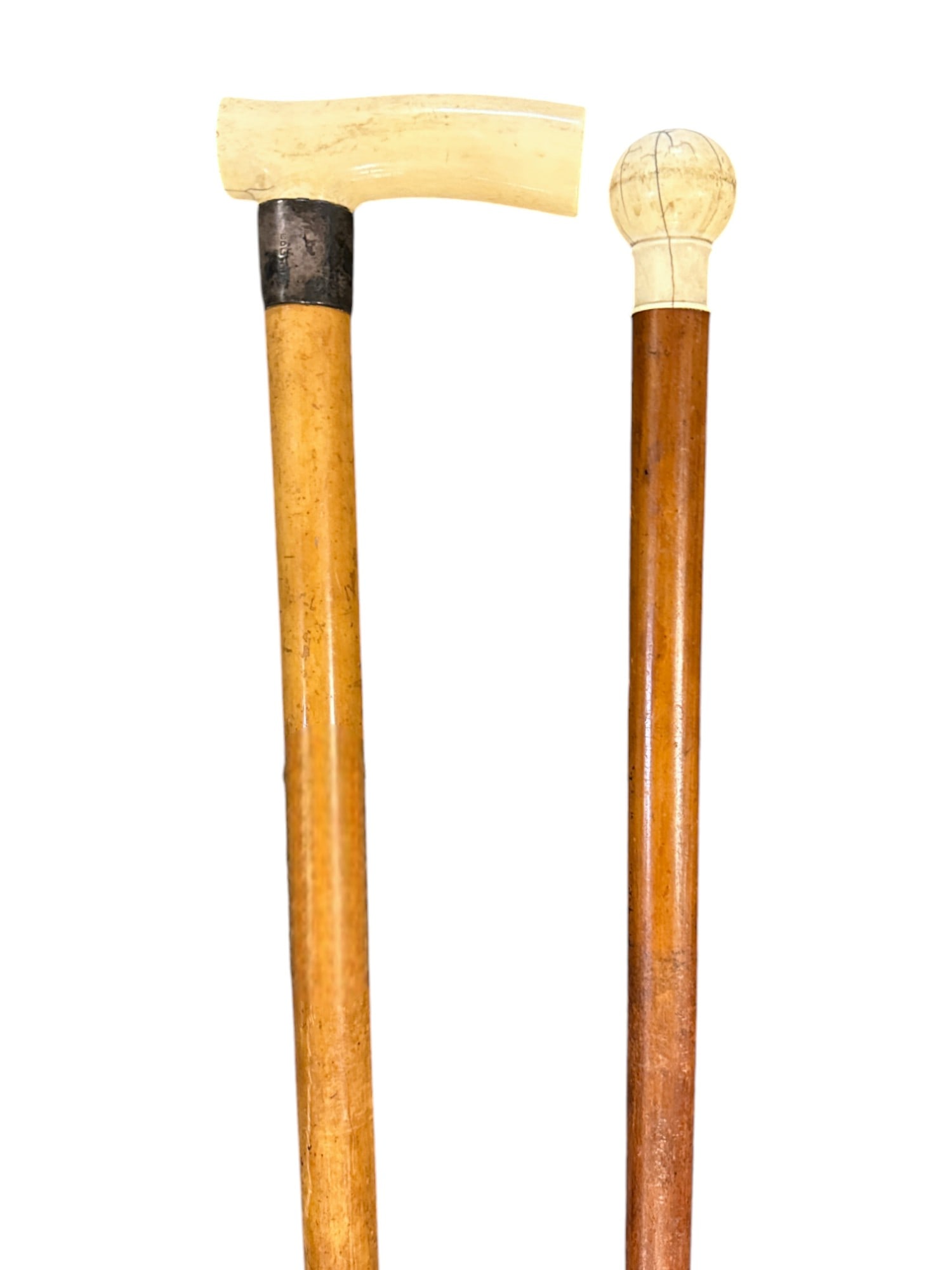 TWO GENTLEMANS WALKING STICKS/ CANES WITH BONE HANDLES: Pair of Walking Sticks/ Canes with Bone handles. Largest Measures 37.5". Total weight 2 lbs. PROVENANCE: The estate of noted Charleston Attorney, Scholar and Passionate Collector, James Kirkland Grant