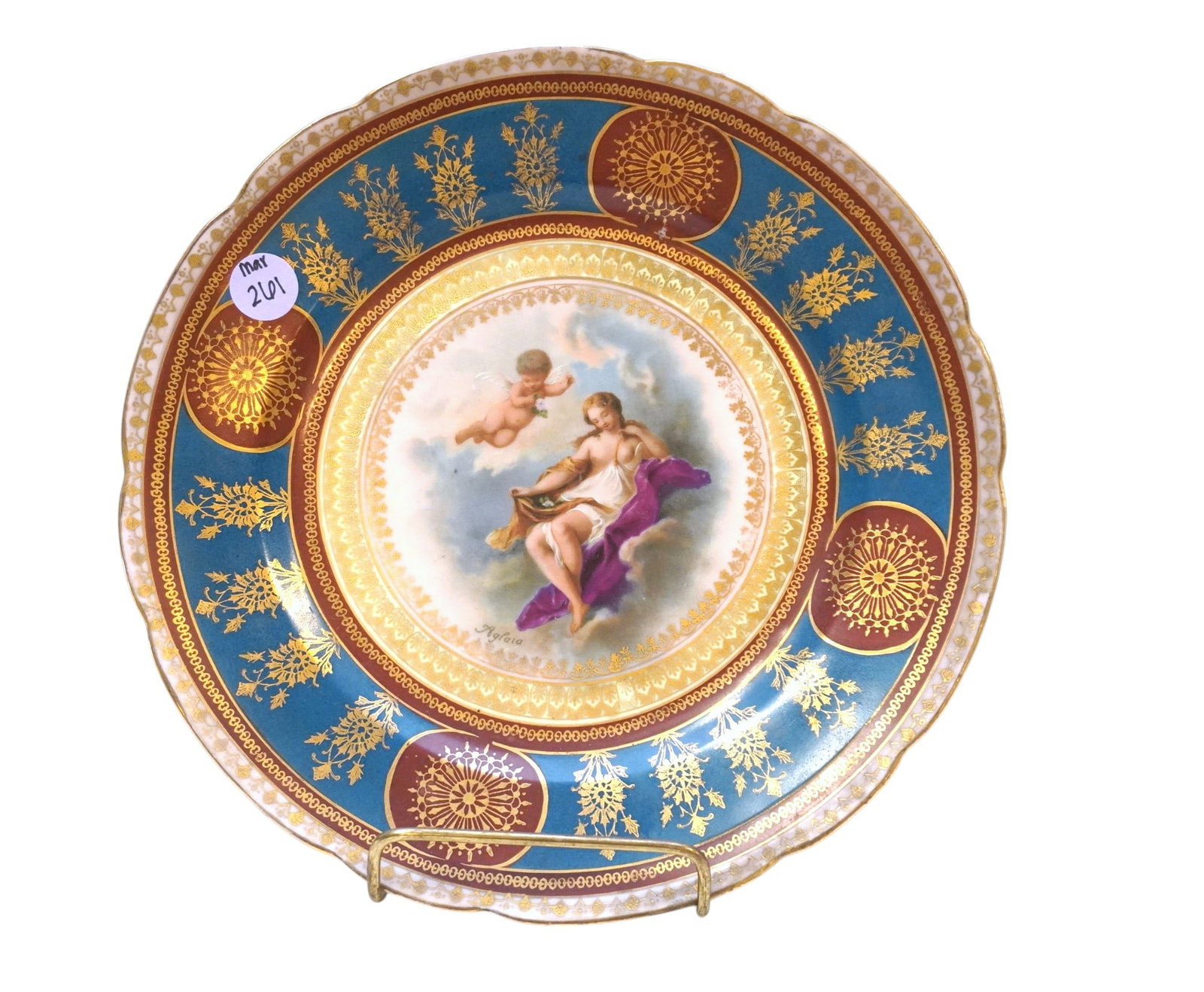 ANTIQUE VIENNA AUSTRIA HAND PAINTED PORTRAIT PLATE: Antique Vienna Austria Hand Painted Portrait Plate. Featuring beautiful gold gilt details and portrait of woman with cherub. Likely 19th century. Measures 9.5" in dia. and weighs 1 lb 1 oz. PROVENANCE