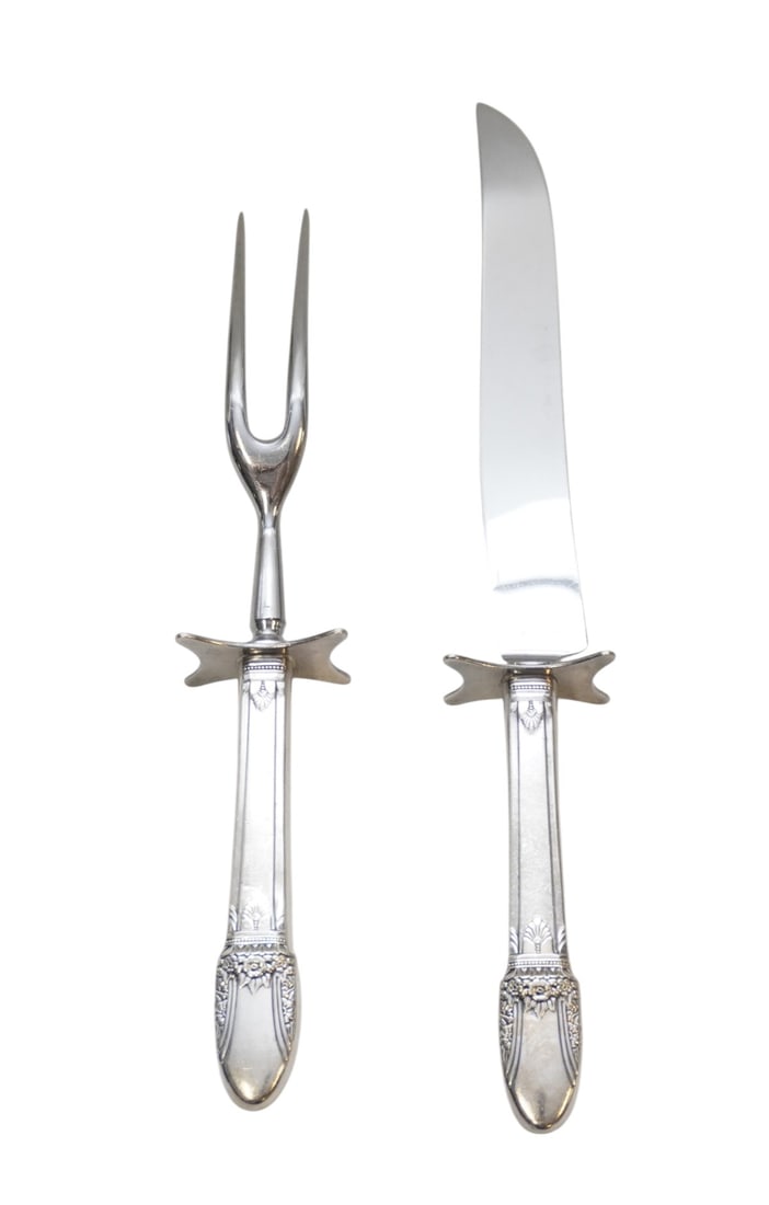 1937 FIRST LOVE INTERNATIONAL SILVER PLATE CARVING SET: Vintage International Silver First Love Silverplate Carving Set 1937. Measures Knife 13". Weight 1 lb 8 oz. PROVENANCE: The Perrin family, of French Huguenot origin, of Abbeville, Perrin Plantation an