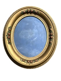 VICTORIAN-ERA GILT WOOD FRAMED OVAL MIRROR WITH POLYCHROME FLORAL DETAIL