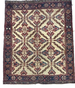 ANTIQUE HAND KNOTTED KUBA RUG