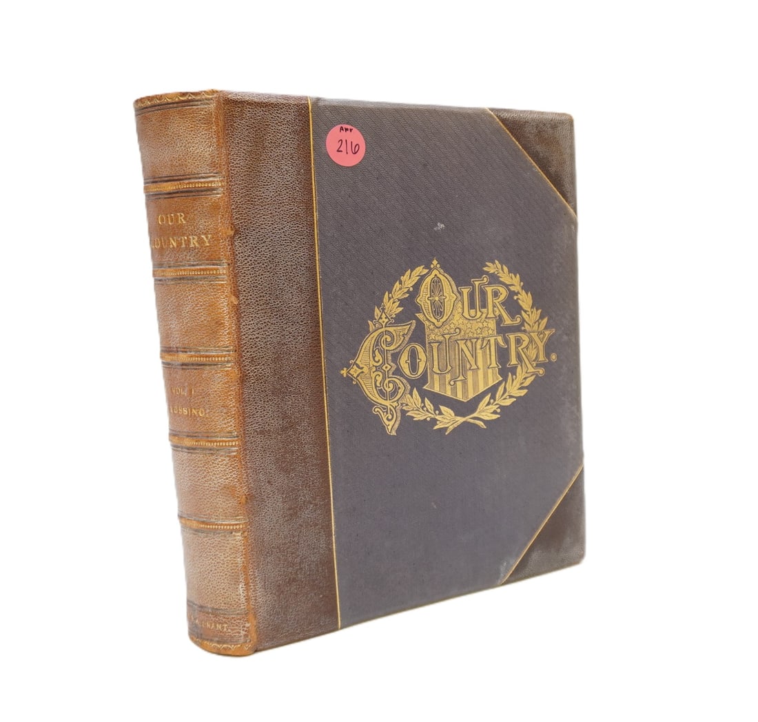 1879 EDITION OF "OUR COUNTRY" BY BENSON J. LOSSING VOL. 1: Antique 1879 Edition of "Our Country" by Benson J. Lossing. Published by Henry J. Johnson, New York and featuring Several Illustrations. Beautifully bound with a leather spine, gold gilt details, and 
