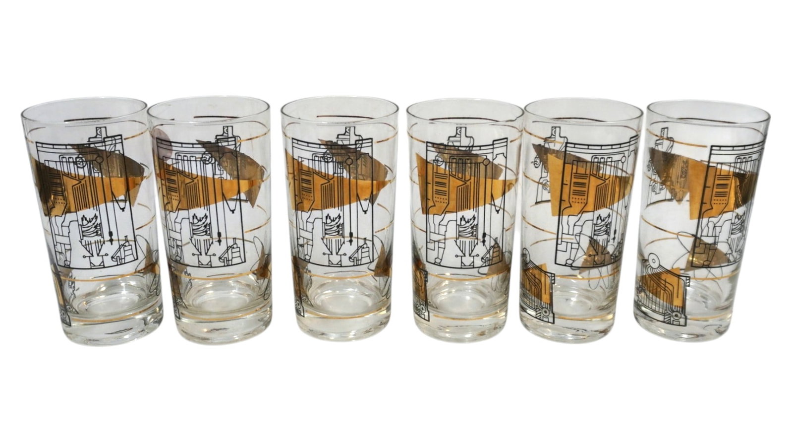 SET OF 7 MID CENTURY HIGHBALL ATOMIC BLACK AND GOLD GLASSES: Set of 7 Mid Century Highball Atomic Black and Gold Glasses. Each measures 5.5" x 2.75" in dia. Total lot weight is 4 lbs.
