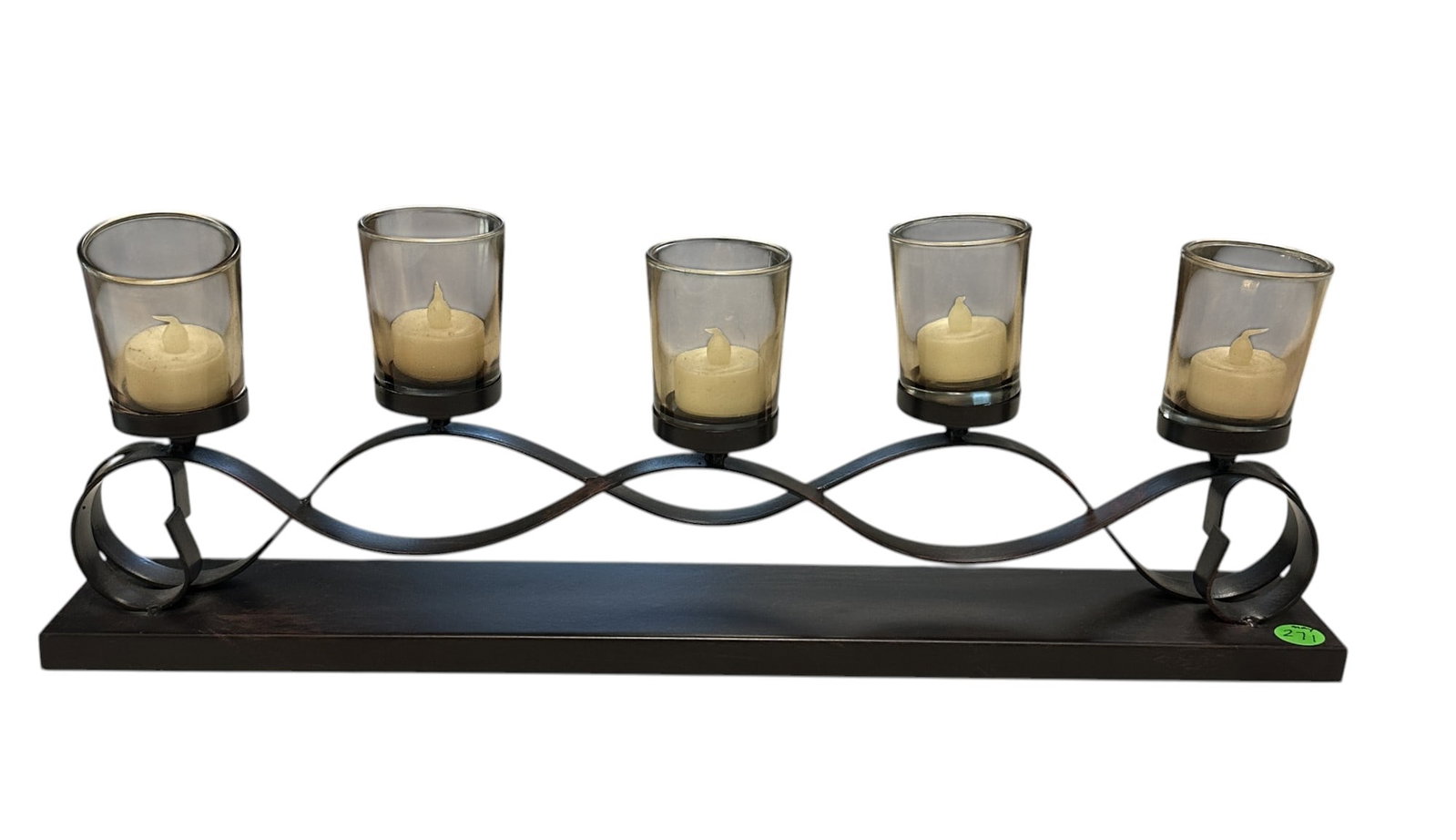 METAL WAVY CANDLE HOLDER: Metal Wavy Candle Holder. Measures 20" x 3.25" and weighs 3 lbs 3 oz.