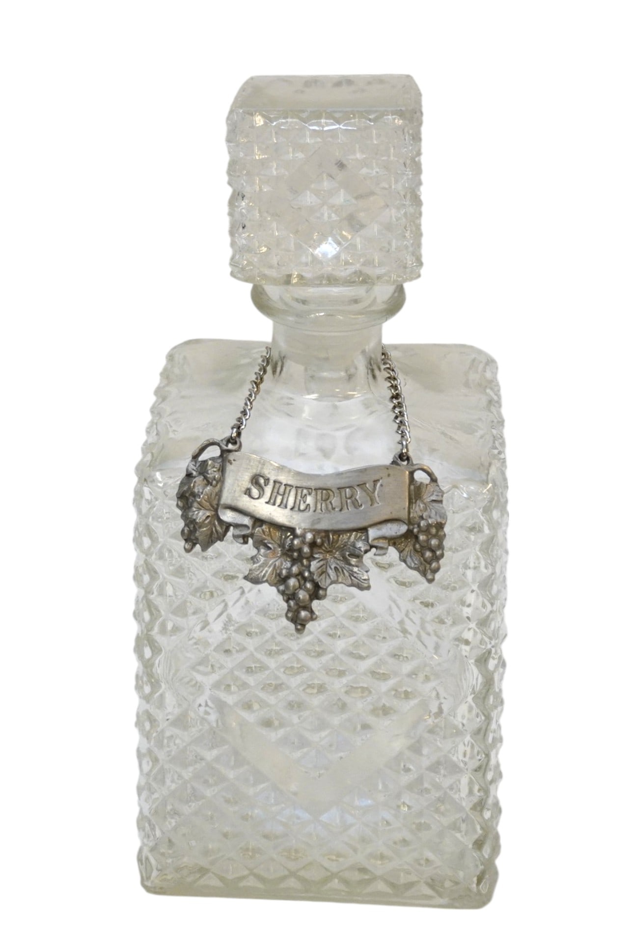 VINTAGE MID CENTURY DECANTER WITH SHERRY TAG: Vintage Mid Century Glass Decanter with Pewter Sherry Tag. Measures 9" x 4" x 4" and weighs 2 lbs 1 oz.