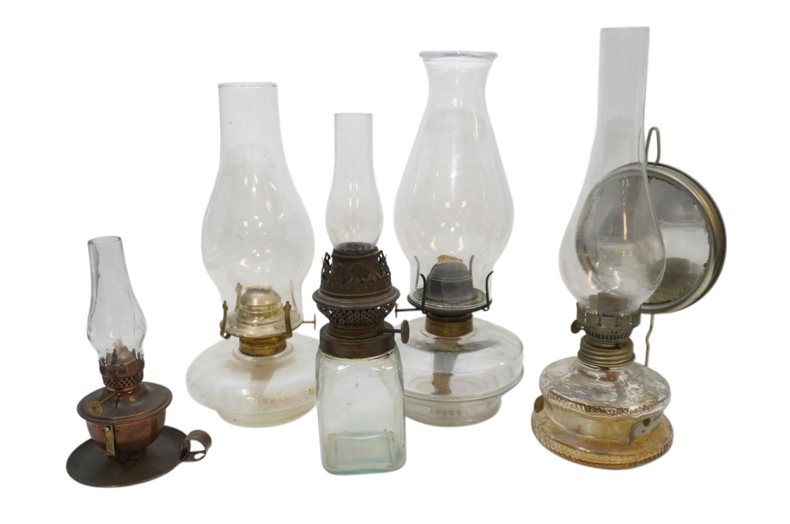 5 ANTIQUE GLASS OIL LAMPS: 5 Antique Glass Oil Lamps. 1 with reflector. Largest 13" with shade. Weight on all 6 lbs