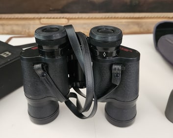 2 MEAD AND BUSHNELL BINOCULARS WITH CASES