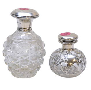 2 ANTIQUE CUT GLASS PERFUME / SCENT BOTTLES STERLING LIDS: 1- Art Nouveau Sterling Silver Overlay Perfume / Scent Bottle 3"x3"x3.25". 2- Cut Glass Perfume / Scent Bottle with Sterling Lid, ding to lid 3.25"x3.25"x5". Weight 1 lb