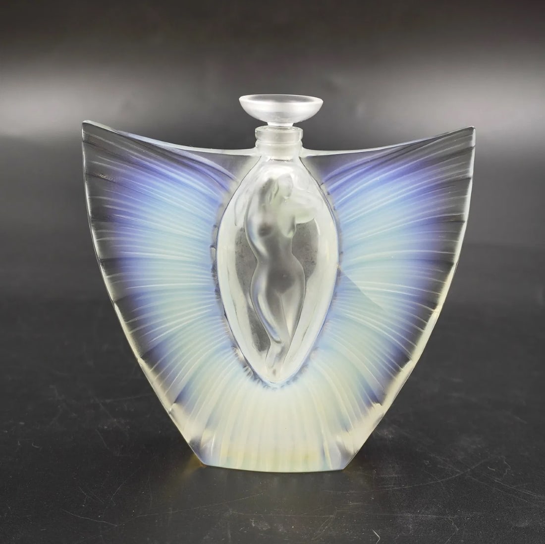 LALIQUE CRYSTAL ART DECO SYLPHIDES PERFUME: Lalique Crystal France Art Deco Sylphides Perfume and Stopper. Measures 5.25"x1.5"x5". Weight 1 lb 3 oz.