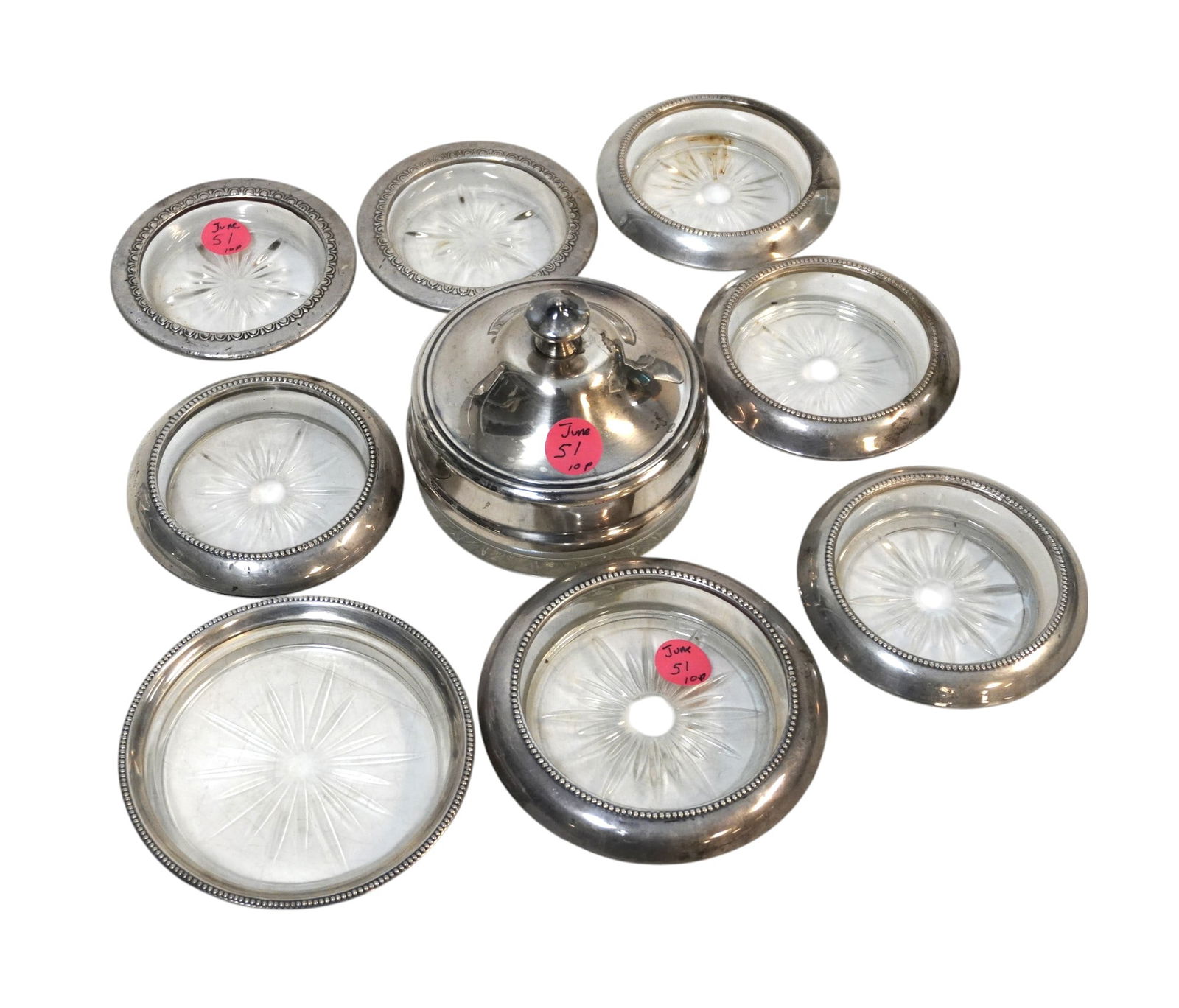 10 pc STERLING RIMMED COASTERS, WINE, DISH: 6 Sterling Rimmed Coasters 3.75", 2 Sterling Rim Wine Bottle Coasters 4.5". 1 Silver Plate Lidded Dish 4"x4"x3.75". Weight on all 2 lbs 13 oz