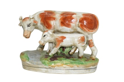 STAFFORDSHIRE POTTERY COW AND CALF