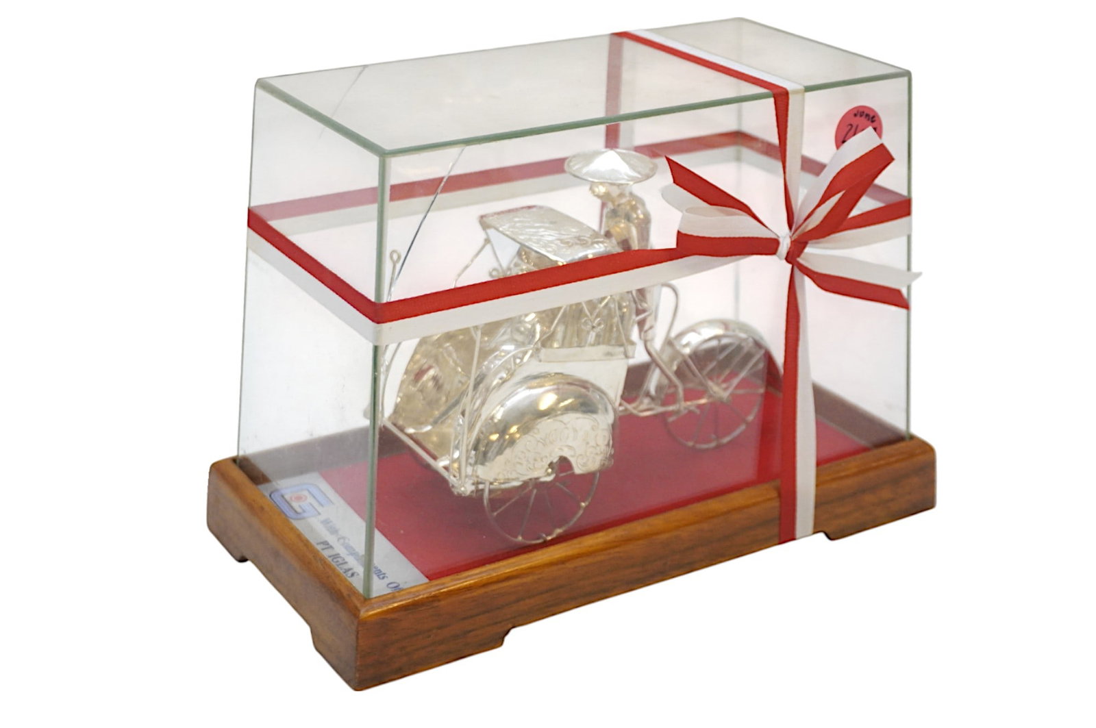 SILVER FILIGREE RICKSHAW FIGURINE: Silver Filigree Rickshaw Figurine in Glass Display Case. Measures 7.25" x 3.5" and weighs 1 lb 5 oz.