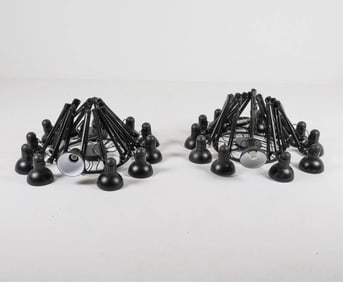 PAIR MANNER OF RON GILAD ARTICULATING ARM CHANDELIERS
