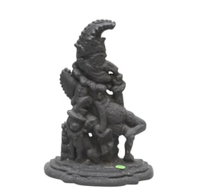 ANTIQUE CAST IRON COURT JESTER WITH DOG DOORSTOP