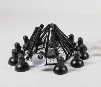 MANNER OF RON GILAD ARTICULATING ARM CHANDELIER