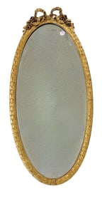 OVAL CARVED GILT BEVELED MIRROR