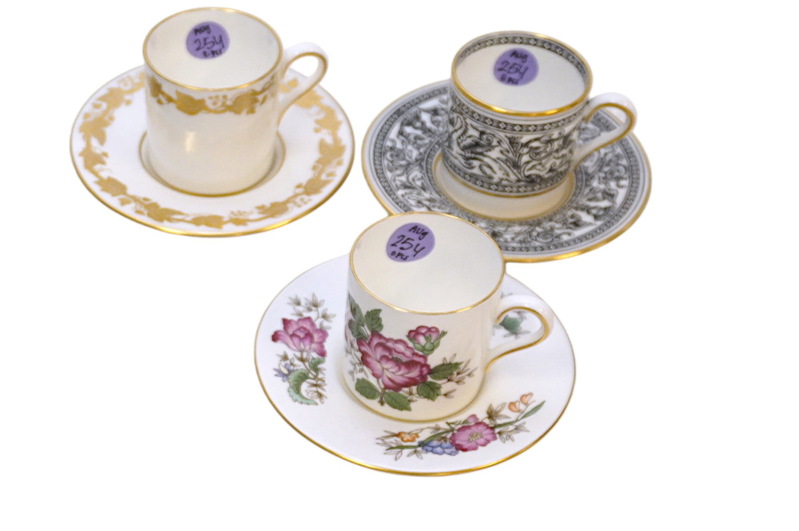 3 VINTAGE WEDGEWOOD DEMITASSE CUPS AND SAUCERS: 3 Vintage Wedgwood Demitasse Cups and Saucers in the patterns Charnwood, Whitehall, and Florentine Black. Cups measure about 2.25" x 3" x 2.25" amd saucers are about 4.75" in dia. Total lot weight is 