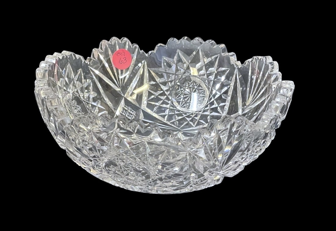 ANTIQUE AMERICAN BRILLIANT CUT GLASS BOWL: Antique American Brilliant Period Cut Glass Bowl with Hobstars, Fans and Sawtooth Edge. Measures 8.25"x8.25"x3.5". Weight 3 lbs 6 oz. PROVENANCE: The Perrin family, of French Huguenot origin, of Abbev
