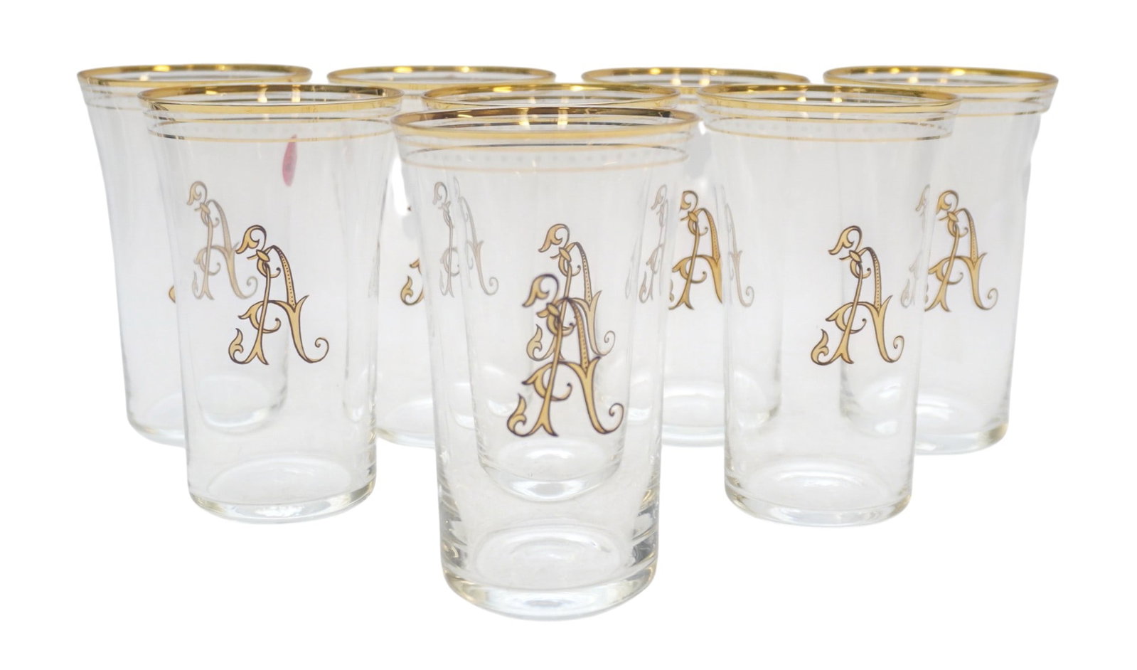 8 CZECH BOHEMIAN BLOWN CRYSTAL TUMBLERS: 4 Czech Bohemian Blown Crystal Tumblers by Abigail. Enameled white Dots GiltA" and gilt accents. Each 5 2/8". Weight on all 3 lbs.PROVENANCE: A Rainbow Row, Charleston SC, Private Estate