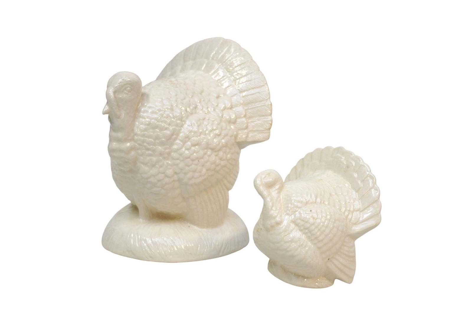 2 VINTAGE WHITE CERAMIC TURKEYS: 2 Vintage White Ceramic Turkeys. One 5"x5"x6 1/2". Small 3"x3 1/2"x4". Weight combined 1 lb 3 oz.