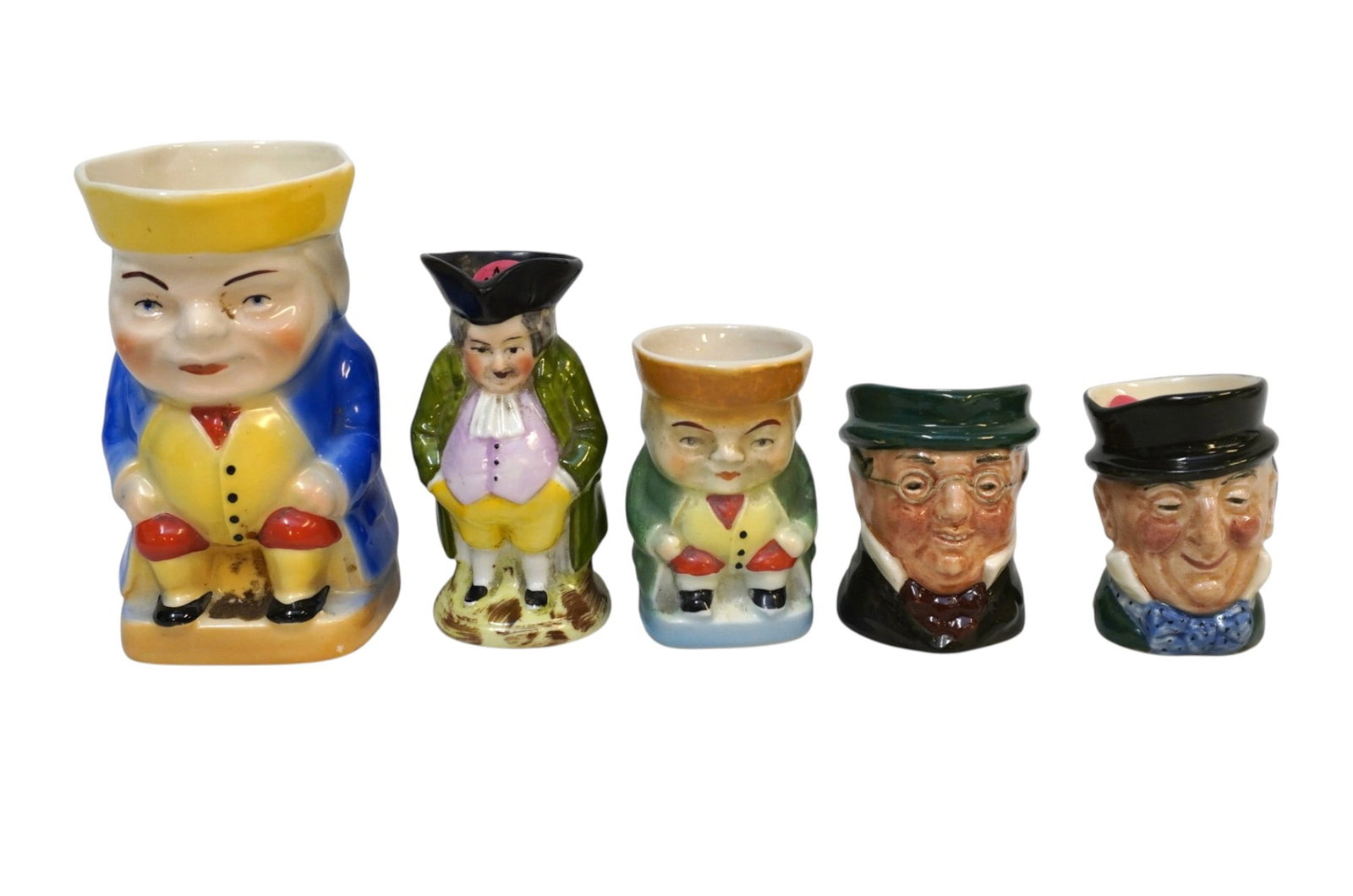 5 ROYAL DOULTON & OTHER TOBY JUGS: 5 Royal Doulton and other Toby Jugs Royal Doulton Two are Mr. Micawber 2.5" and Mr. Pickwick. 2.5". Tallest 4". Weight on all 14 oz
