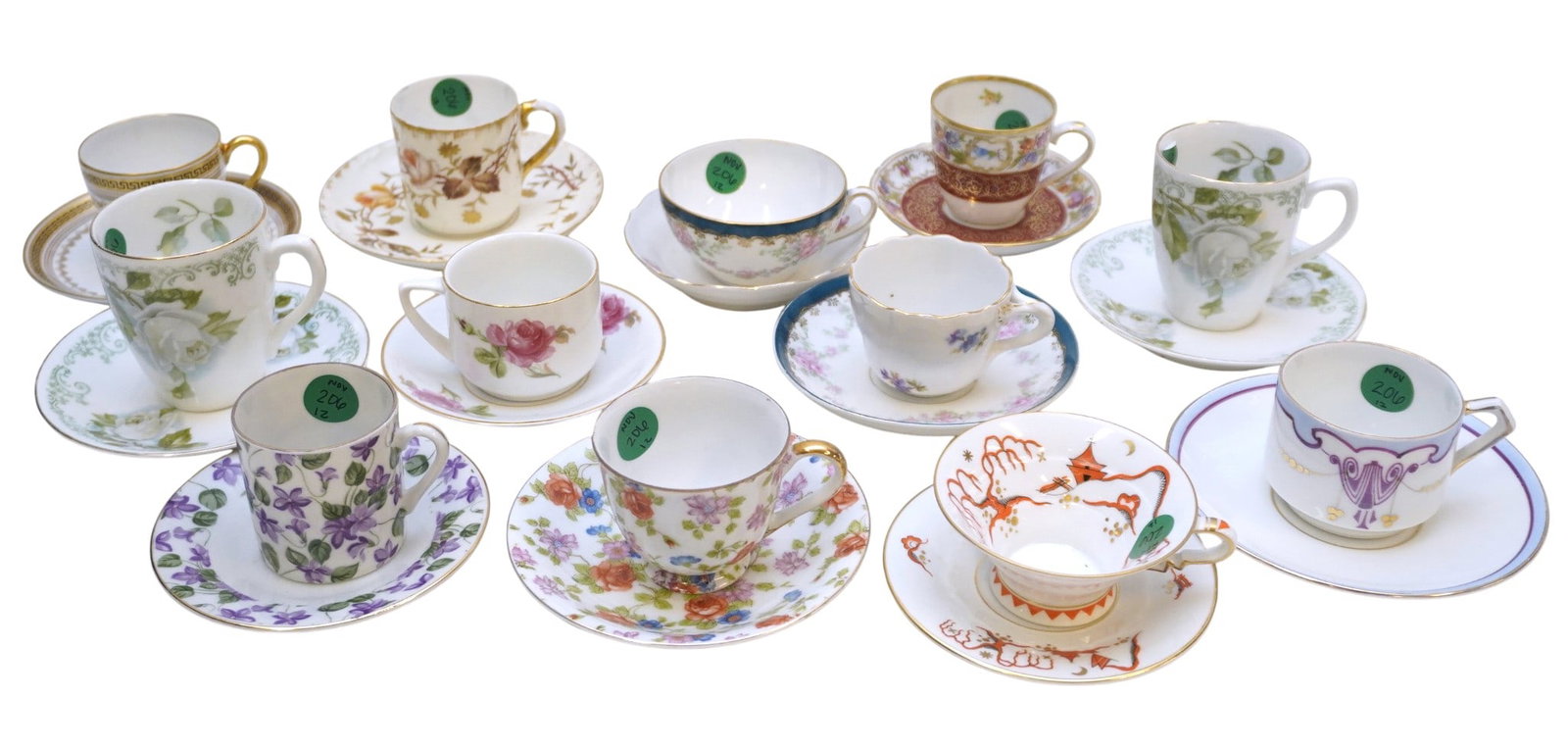 12 DEMITASSE CUPS AND SAUCERS - LIMOGES, ROSENTHAL, MERIT, ETC.: 12 Demitasse Cups and Saucers including Limoges, Rosenthal, Merit, and more. Largest is about 3" tall. Total lot weight is about 2 lbs 14 oz. **In house shipping available on this lot**