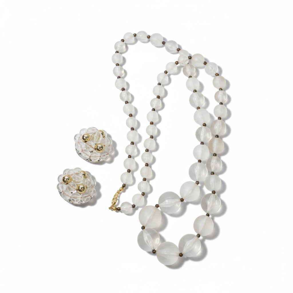 MID CENTURY LUCITE BEAD NECKLACE & EARRINGS: Large Vintage Mid Century Lucite Graduated Bead Necklace and Wired Lucite Bead Clip On Earrings. Purchased at the old Kerrisons Department Store at 260 King Street, Charleston. Necklace opened 30". Ea