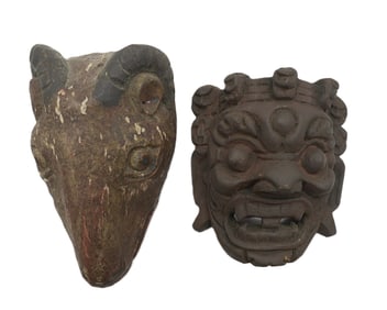 TWO ANTIQUE ASIAN CARVED WOOD MASKS