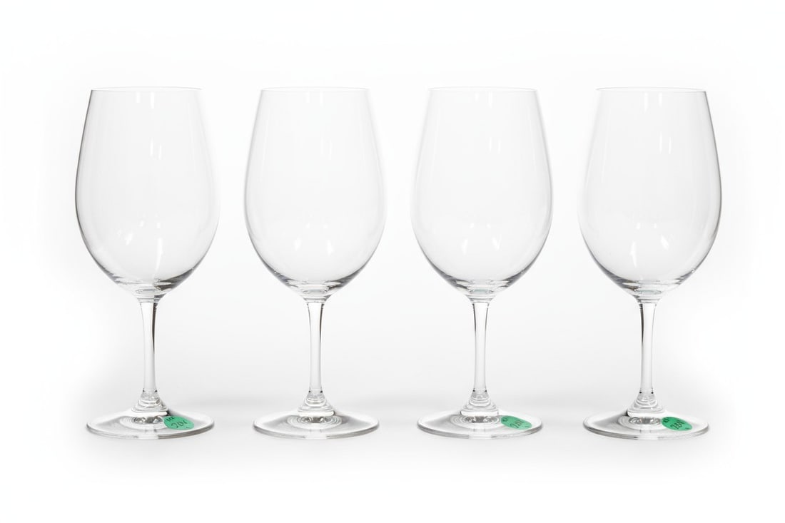 4 RIEDEL WINE GLASSES: 4 Riedel Wine Glasses. Each measures 7.75" x 3.25", total lot weight is 1 lb 6 oz. **In house shipping available on this lot**