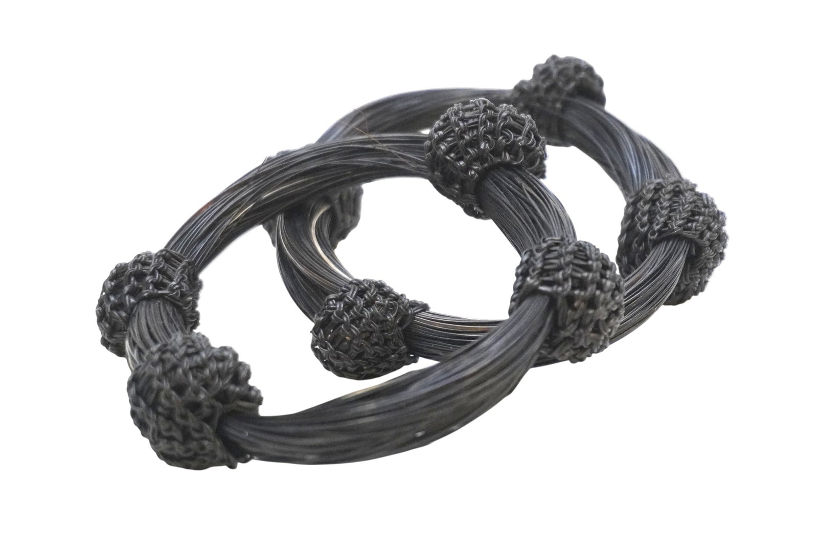 2 AFRICAN TRIBAL WOVEN BLACK ELEPHANT HAIR BRACELETS: 2 African Tribal Woven Black Elephant Hair Bracelets. Each measures about 3.25" in dia. and total lot weight is 1 oz. **In house shipping available on this lot**