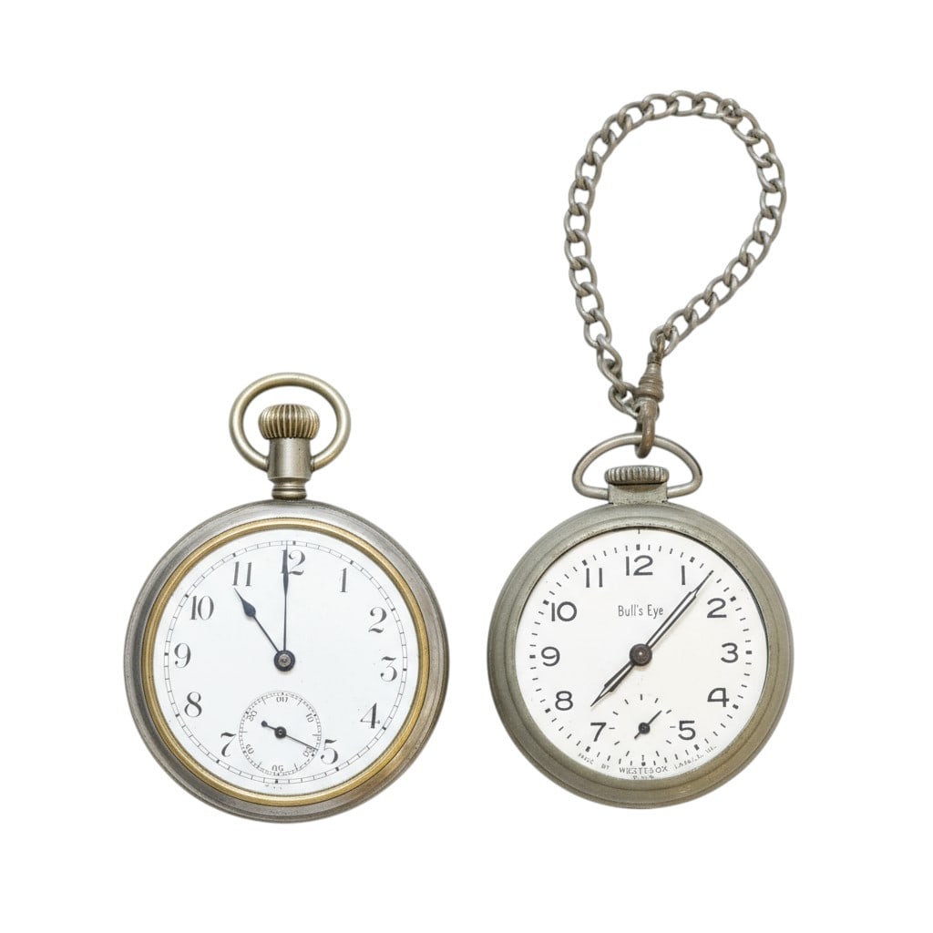 2 ANTIQUE POCKET WATCHES: Westclox Bulls Eye missing glass. Unmarked Pocket Watch. Both not working. 2 1/2"& 2 1/4", Weight 6 oz. PROVENANCE:The Historic 1798 John Burckmeyer House, 120 Wentworth Street, Charleston SC **In hou