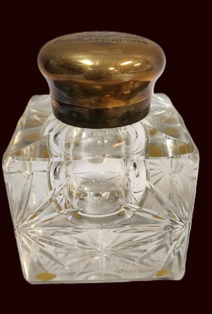 LARGE 1904 ABP CUT GLASS INKWELL KANSAS CITY: Large 1904 American Brilliant Cut Glass Inkwell with gilded brass lid inscribed Kansas City Golf Championship 1904 Consolation Prize. Measures 3"x3"x4". Weight 1 lb 12 oz.