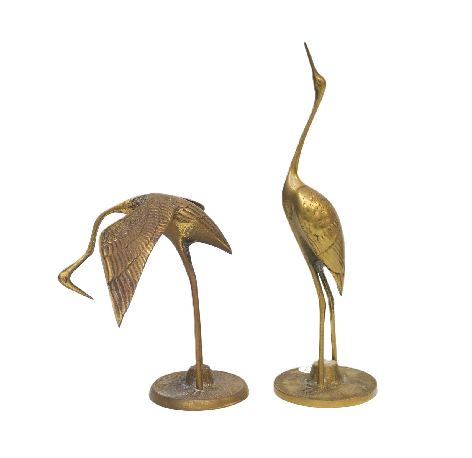 PAIR OF MID CENTURY BRASS CRANES: Pair of Mid Century Brass Cranes. Taller is 10" x 4" dia. Total lot weight is 4 lbs.