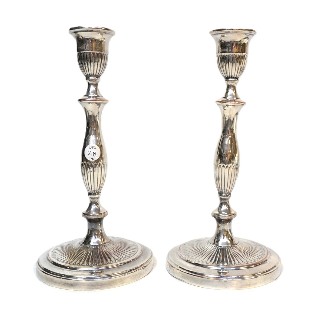 VINTAGE SILVERPLATE CANDLESTICKS: Pair of Vintage Silverplate Candlesticks. Each measures 11" x 5.5".