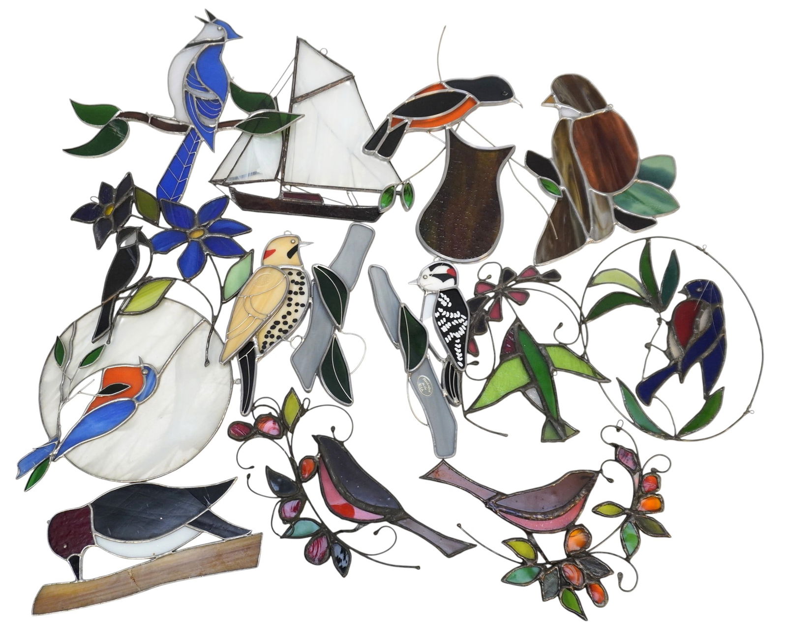 13 STAINED GLASS ART PIECES: 13 Stained Glass Art Pieces. 12 are birds and 1 is ship. Total lot weight is 4 lbs 3 oz.